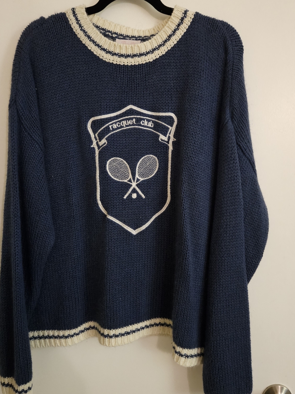 Pink Lily Navy Crewneck Sweater with Cream Trim and Tennis Crest Patch